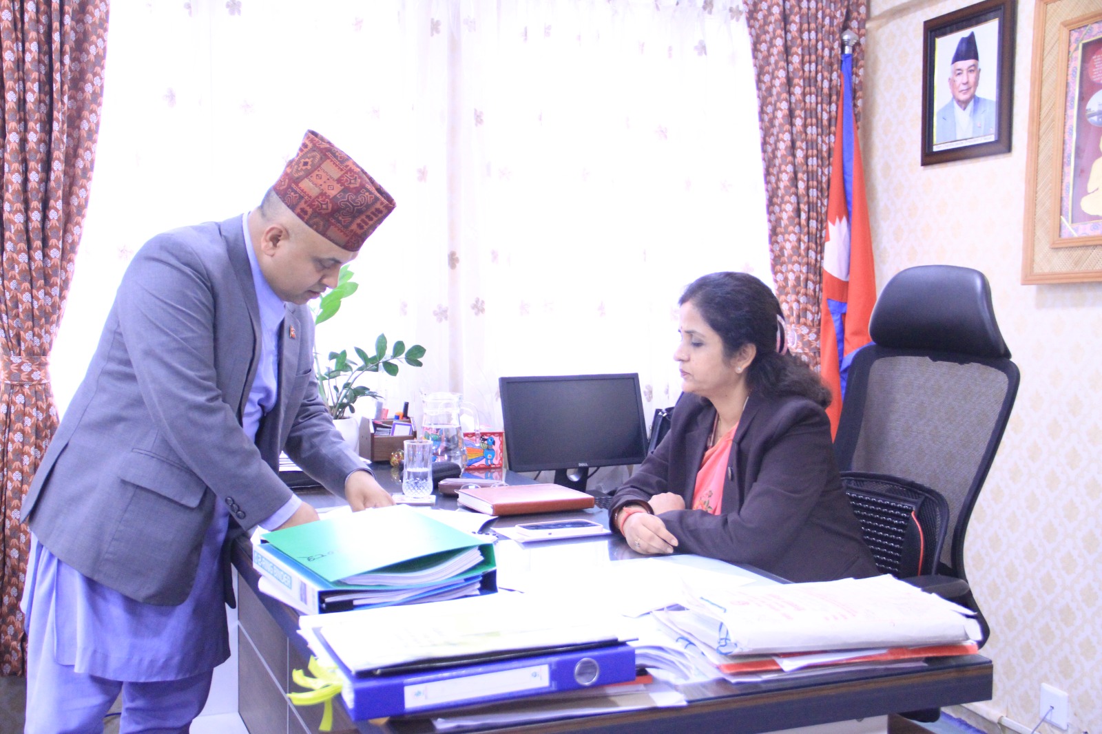The Secretary presents the report of the work done within 100 days after the formation of the government to the Honorable Minister.
